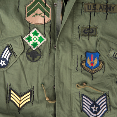 badged army gilet detail